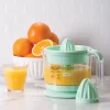 Dash Citrus Juicer Extractor: Compact Juicer for Healthy Juice, Oranges, Lemons, Limes, Grapefruit & other Citrus Fruit with Easy Pour Spout + 32 oz Pitcher - Aqua