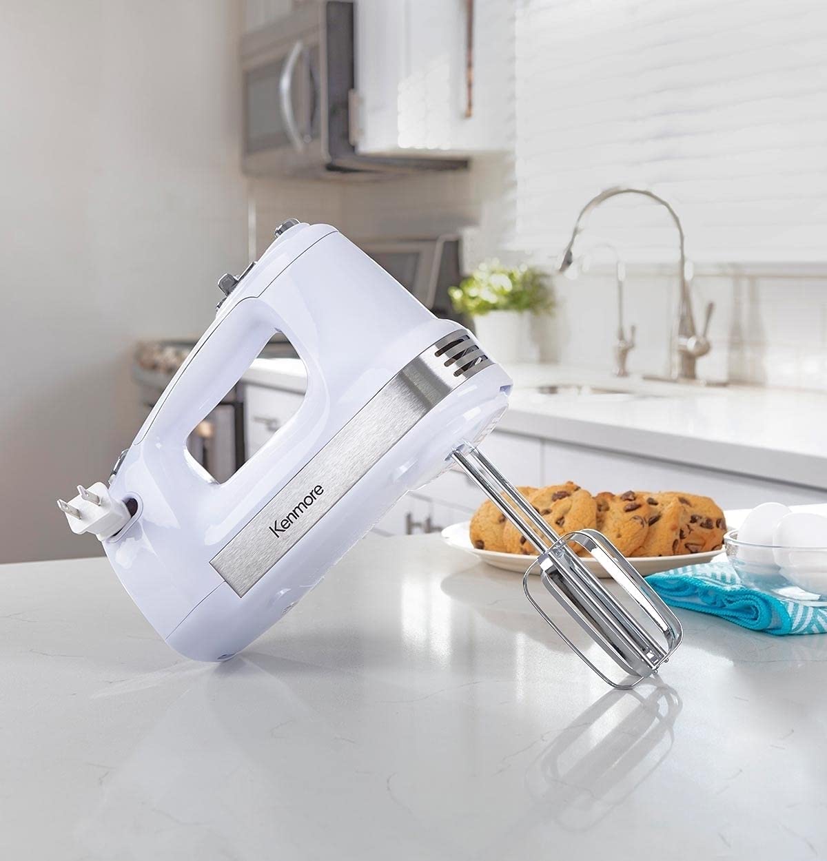 https://bigbigmart.com/wp-content/uploads/2022/07/Kenmore-5-Speed-Hand-Mixer-Beater-Blender-250-Watts-with-Beaters-Dough-Hooks-Liquid-Blending-Rod-Automatic-Cord-Retract-Burst-Control-and-Clip-On-Accessory-Storage1.jpg