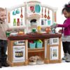 Step2 Fun with Friends Kitchen Set for Kids – Tan – Includes Toy Kitchen Accessories, Interactive Features for Pretend Play – Indoor/Outdoor Toddler Playset – Dimensions: 40.88" H x 35.75" W x 12.5" D