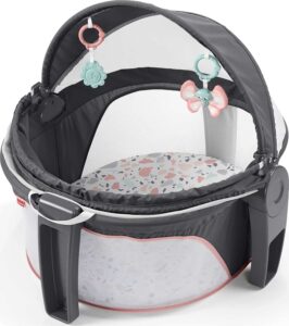 Fisher-Price Portable Bassinet and Play Space On-The-Go Baby Dome with Developmental Toys and Canopy, Pink Pacific Pebble