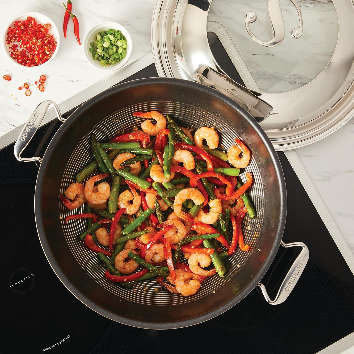https://bigbigmart.com/wp-content/uploads/2023/09/Circulon-Clad-Stainless-Steel-Wok-Stir-Fry-with-Glass-Lid-and-Hybrid-SteelShield-and-Nonstick-Technology-14-Inch-Silver4.jpg
