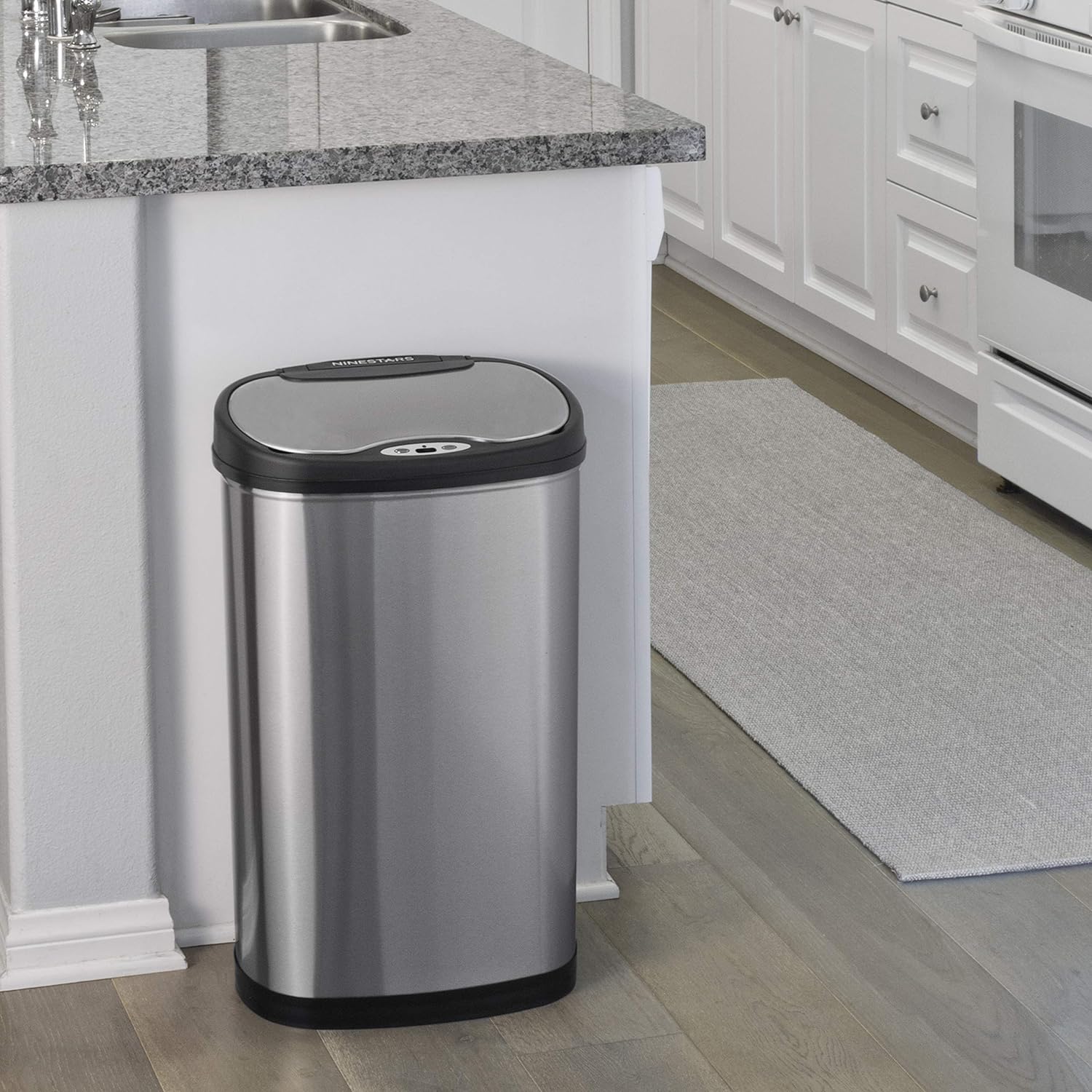 https://bigbigmart.com/wp-content/uploads/2023/10/NINESTARS-DZT-50-13-Automatic-Touchless-Motion-Sensor-Oval-Trash-Can-with-Black-Top-13-gallon-50-L-Stainless-Steel7.jpg
