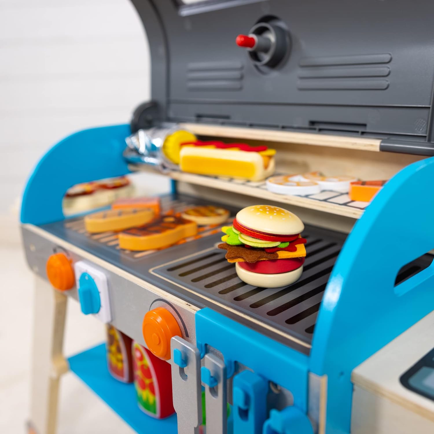 https://bigbigmart.com/wp-content/uploads/2023/11/Melissa-Doug-Wooden-Deluxe-Barbecue-Grill-Smoker-and-Pizza-Oven-Play-Food-Toy-for-Pretend-Play-Cooking-for-Kids3.jpg