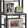 VASAGLE Hutch Bakers Rack with Power Outlet, 14 Hooks Microwave Stand, Adjustable Coffee Bar with Metal Wire Panel, Kitchen Storage Shelf, 15.7 x 23.6 x 66.9 Inches, Greige and Black UKKS037B02