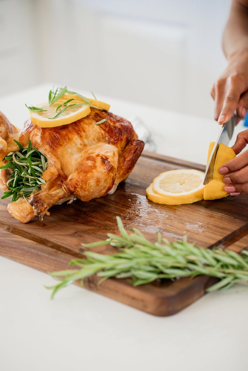 ROSSIE HOME Wood Cutting Board, Heavy-Duty, Pre-Oiled, Reversible Charcuterie Board with Juice Groove, Divided Wells, and Carrying Handles for Kitchen - Black Walnut - 17x13 Inch - Style No. 6053422